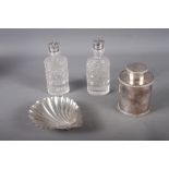A silver scallop shaped butter dish, 2oz troy approx, a silver plated tea caddy and two cut glass