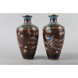 A pair of cloisonne enamel vases with Phoenix and insects on an aventurine ground, 7" high (slight