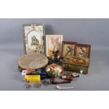 A tambourine, two early 20th century decoupage Easter eggs, a collection of briar pipes, etc