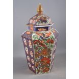 An early 19th century English porcelain hexagonal jar and cover with Imari decoration, 19 1/2"