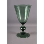 A green glass goblet, 13 1/2" high