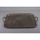 A Goldsmiths & Silversmiths silver plated two-handled tray, 25" wide