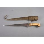 An Indian dagger with steel blade and carved handle with engraved brass and copper scabbard, 18 1/2"