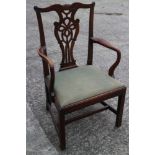 A Georgian provincial ash carver chair with pierced splat and drop-in seat, on chamfered and