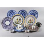 Two Quimper figure decorated plates, four blue and white tin glazed plates, a number of Doulton bone