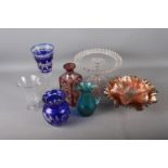 A Bohemian red and clear cut glass decanter, a blue and clear cut glass goblet, 9" high, a tazza and