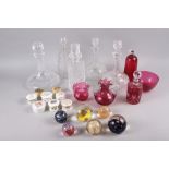 A Caithness "Moon Crystal" paperweight, five other paperweights, five decanters, cranberry glassware