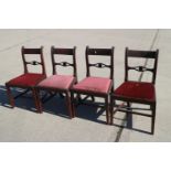 A set of four 19th century mahogany pierced bar back standard chairs with drop-in seats, on square
