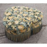 A Peter Dudgeon trefoil ottoman, button upholstered in a floral tapestry, 36" dia x 17" high