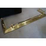 A brass rail fender, 54" wide