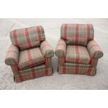 A pair of deep seat armchairs with loose seat and back cushions, upholstered in a tartan fabric