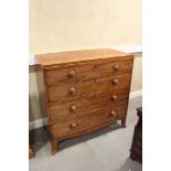 A George III mahogany, banded and ebony line inlaid chest of four long graduated drawers with knob