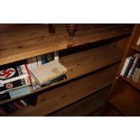 A pine open bookcase, fitted adjustable shelves, 62" wide x 16" deep x 43" high