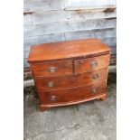 A mahogany bowfront chest of two short and two long drawers, on bracket feet, 37 1/2" wide x 20"