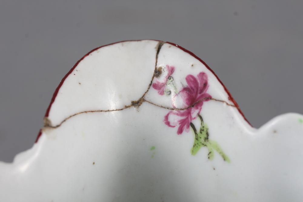 A Longton Hall cream jug with openwork twist handle and leaf relief decoration and enamel floral - Image 7 of 11