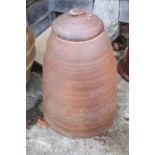 A stoneware rhubarb forcer with lid, 24" high