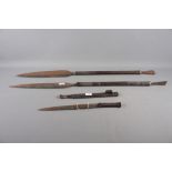 Two East African carved hardwood spears, 40" long, and a similar knife and scabbard, 19" overall