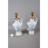 A pair of blue and white urn-shaped table lamps with shades, 12" high