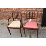 A set of four polished as mahogany splat back standard dining chairs, upholstered in a pink