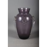 An early 20th century amethyst glass vase with applied decoration, 10" high