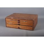 A collector's pine coin box, fitted four drawers, 14 1/4" wide x 10 1/2" deep x 5 1/4" high