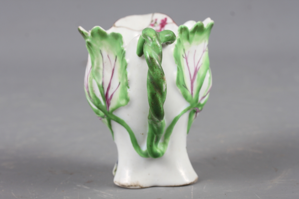 A Longton Hall cream jug with openwork twist handle and leaf relief decoration and enamel floral - Image 4 of 11