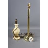 An onyx table lamp, 10 1/4" high, and a brass table lamp, 17 1/2" high