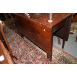 An early 20th century mahogany Sutherland dining table, 41" wide x 18" deep x 29" high (56" when