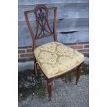 A late Victorian walnut side chair with pierced splat and stuffed over seat, on turned supports