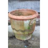 A terracotta plant pot with undulated decoration and relief handles, 13 3/4" dia x 12 1/2" high