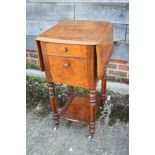 A 19th century burr yew and rosewood banded flap top bedside table, fitted one drawer and