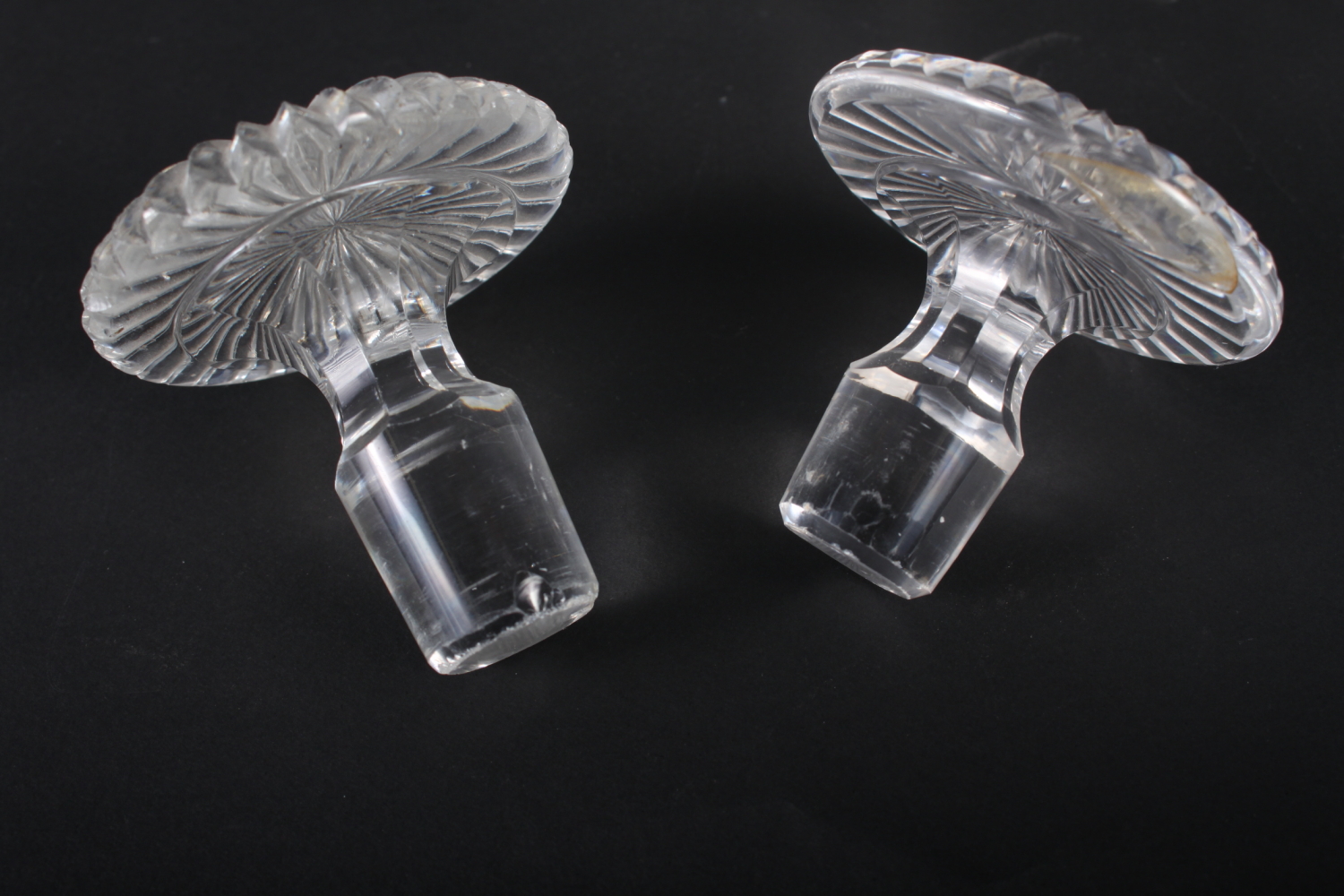 A pair of Georgian cut glass decanters with ribbed necks, 10 1/4" high (chips to stoppers and necks) - Image 2 of 4