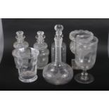 A Stuart Crystal decanter, a cut glass celery vase, 8 1/2" high, a pair of cut glass decanters (