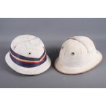 A mid 20th century polo helmet, by Holbrow, and another by Walter Holbrow & Sons Ltd