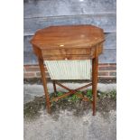 A George III figured mahogany and ebony line inlaid octagonal work table, fitted drawer and fabric