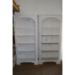 A pair of white painted carved pine open bookcases with reeded sides, on bracket feet, 33 1/2"