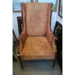 A pair of Edwardian mahogany and box line inlaid showframe high wing-back armchairs, on square taper