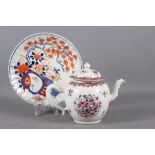 A Chinese export porcelain famille rose teapot with floral decoration, 6 1/2" high (spout restored),