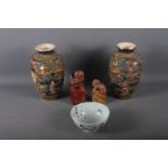 A pair of Japanese baluster vases with relief figure and tree decoration, 10" high, a carved
