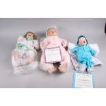A quantity of porcelain dolls by "The Ashton-Drake Galleries", including "Heirloom Baby" TA8473, 21"