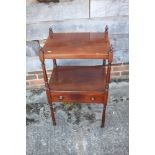 A late 19th century mahogany two-tier washstand, fitted one drawer, on turned supports, 19" wide x