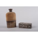 A Victorian silver mounted spirit flask with removable cup and a white metal rectangular box with