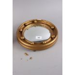 A giltwood and ball decorated circular mirror with convex plate, 7 1/4" dia