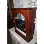 A mahogany cupboard enclosed mirror door, two corner wall shelves and one other wall shelf