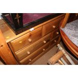 A waxed pine chest of three small and four large drawers, on block base, 51" wide x 17" deep x 29"