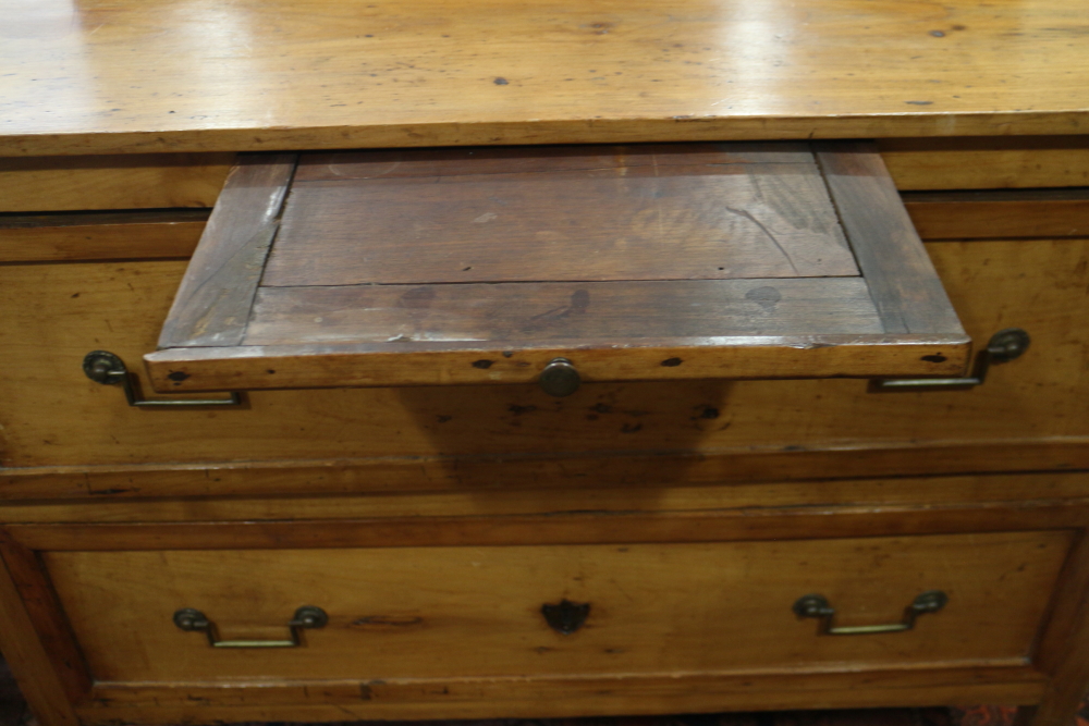 A 19th century French provincial fruitwood commode, fitted slide over two drawers, on square taper - Image 2 of 3