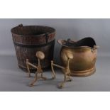 A coopered oak coal bucket, a copper coal helmet and a pair of brass andirons