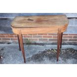 A Georgian mahogany and line inlaid fold-over top card table, on square taper supports 36" wide x