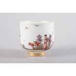 A Meissen 18th century chocolate cup with figure and landscape decoration, 2 1/2" high
