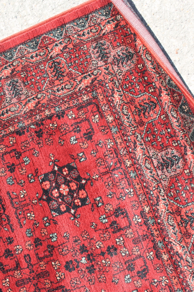 A Royal Kashqai Afghan style pile rug with eight central elephant guls and multi-borders on a - Image 2 of 5
